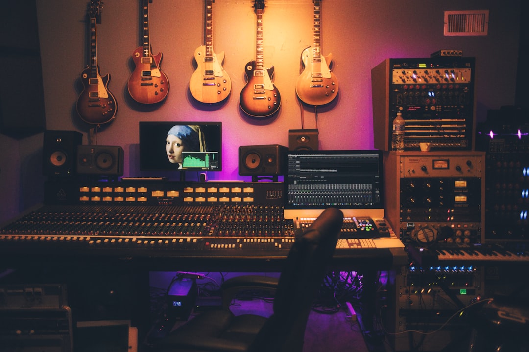 International music producers collaborating in a Seoul recording studio