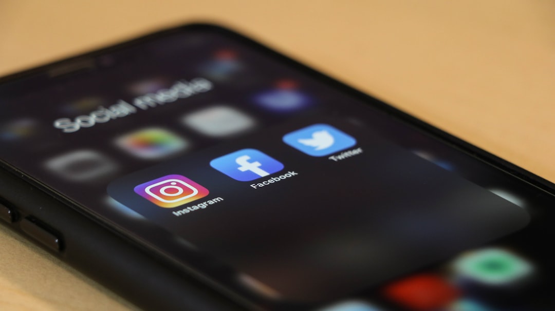Social media app icons on smartphone screen
