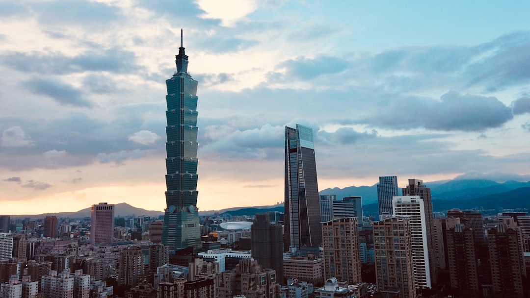 Taiwan tech office workers using AI software on computers