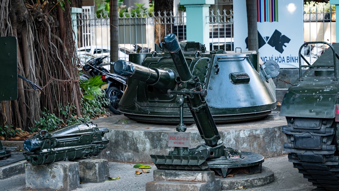 Vietnamese military personnel reviewing technology systems