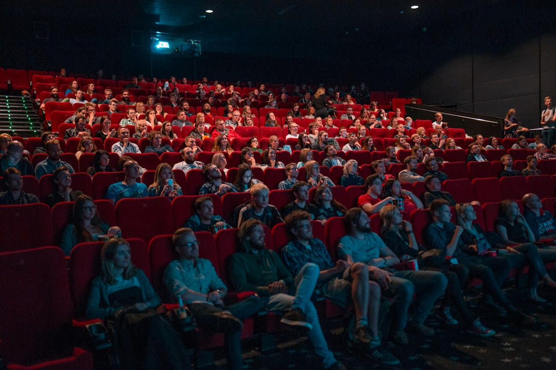 Cinema audience watching national film screening
