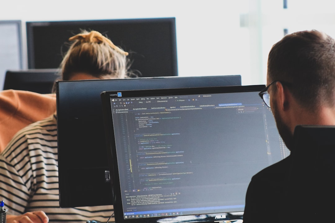 Developers coding during a hackathon event