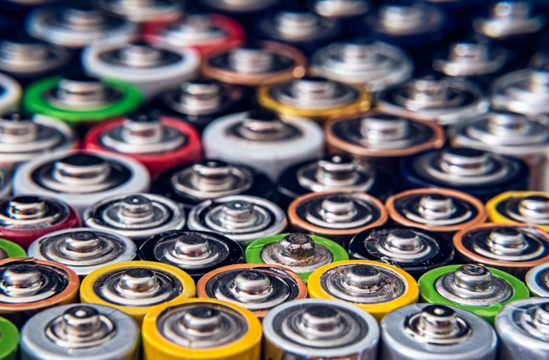 Battery cathode powders and lab containers on a bench