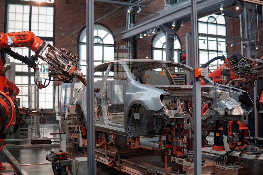 Automotive assembly line with robots and workers