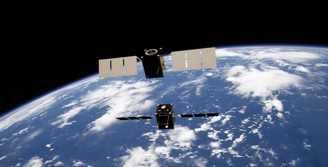 Field team using satellite comms and maps